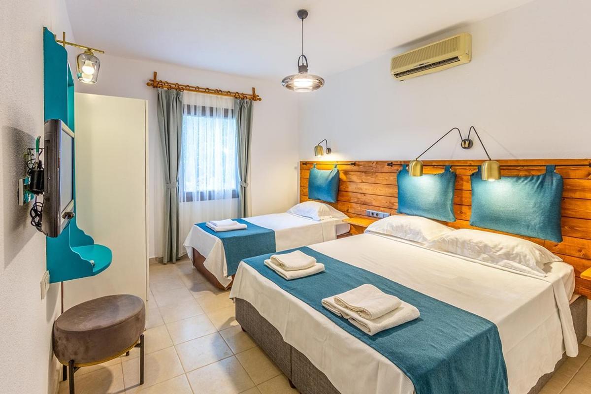 Avlu Otel Datca Bagian luar foto